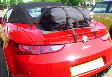 red alfa brera spider 939 with a boot-bag original luggage rack fitted to the boot
