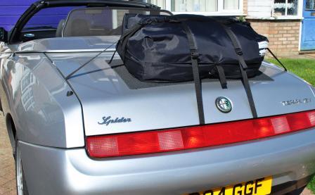 silver alfa romeo spider 916 with a boot-bag original luggage rack fitted