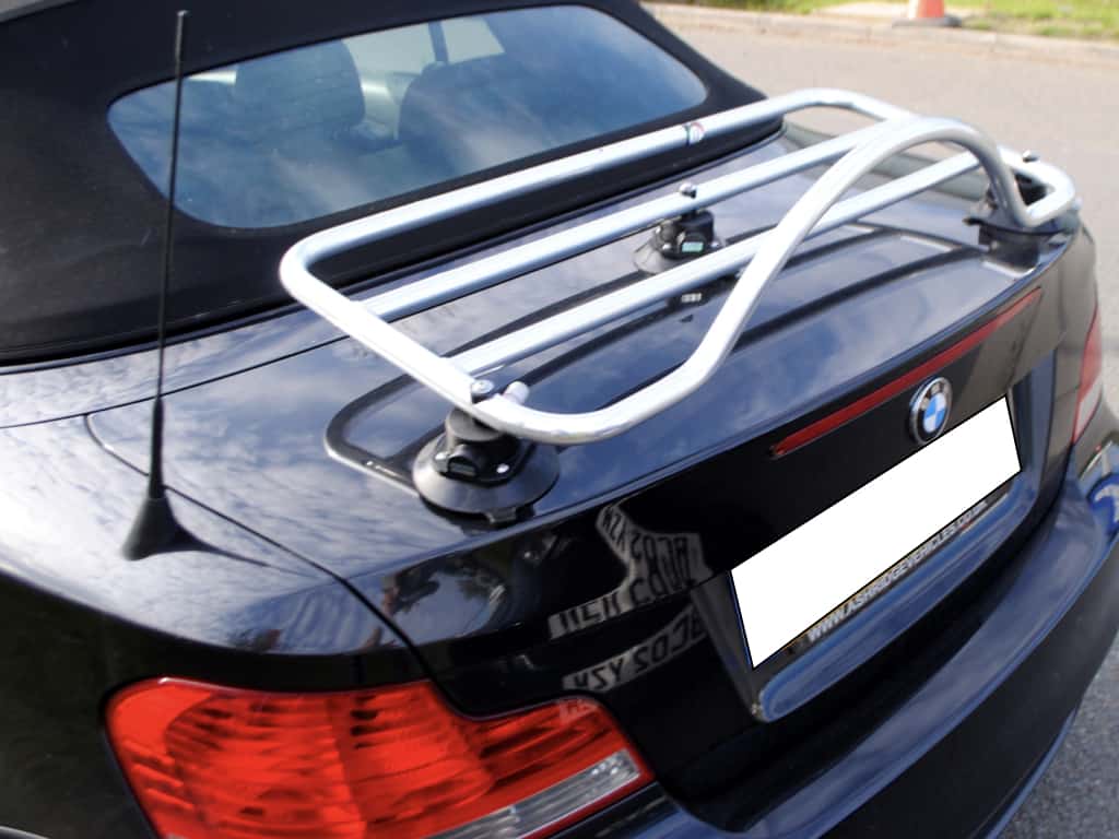 dark blue bmw 1 series convertible with a revo-rack luggage rack fitted photographed from the side