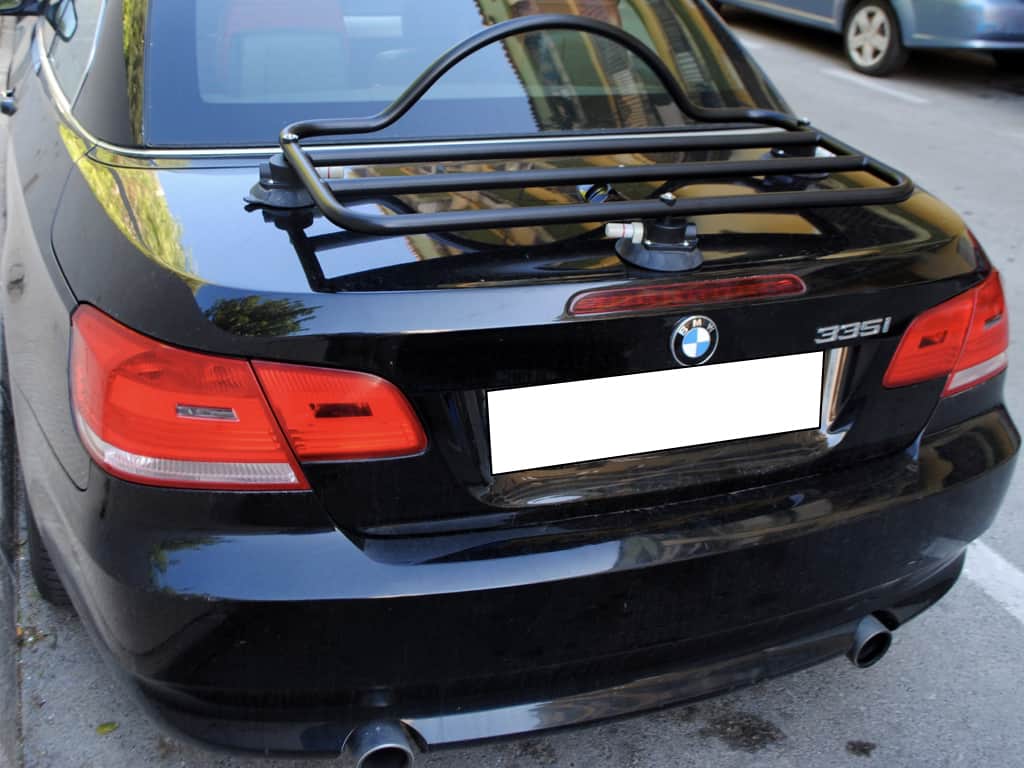 rear view of black bmw 3 series e93 cabriolet with a black luggage rack fitted