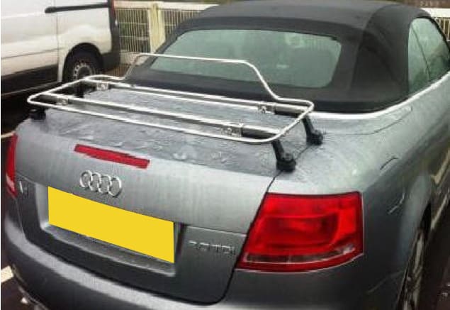 silver audi a4 convertible with a stainless steel luggage rack fitted