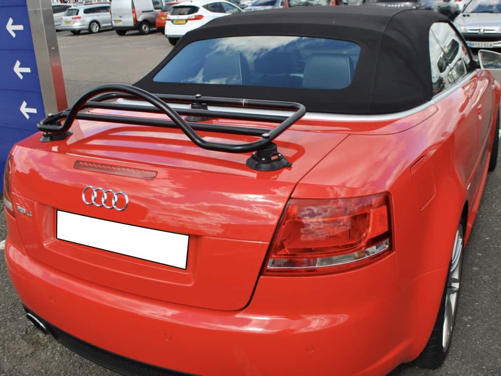 red audi rs4 convertible with a revo-rack black fitted