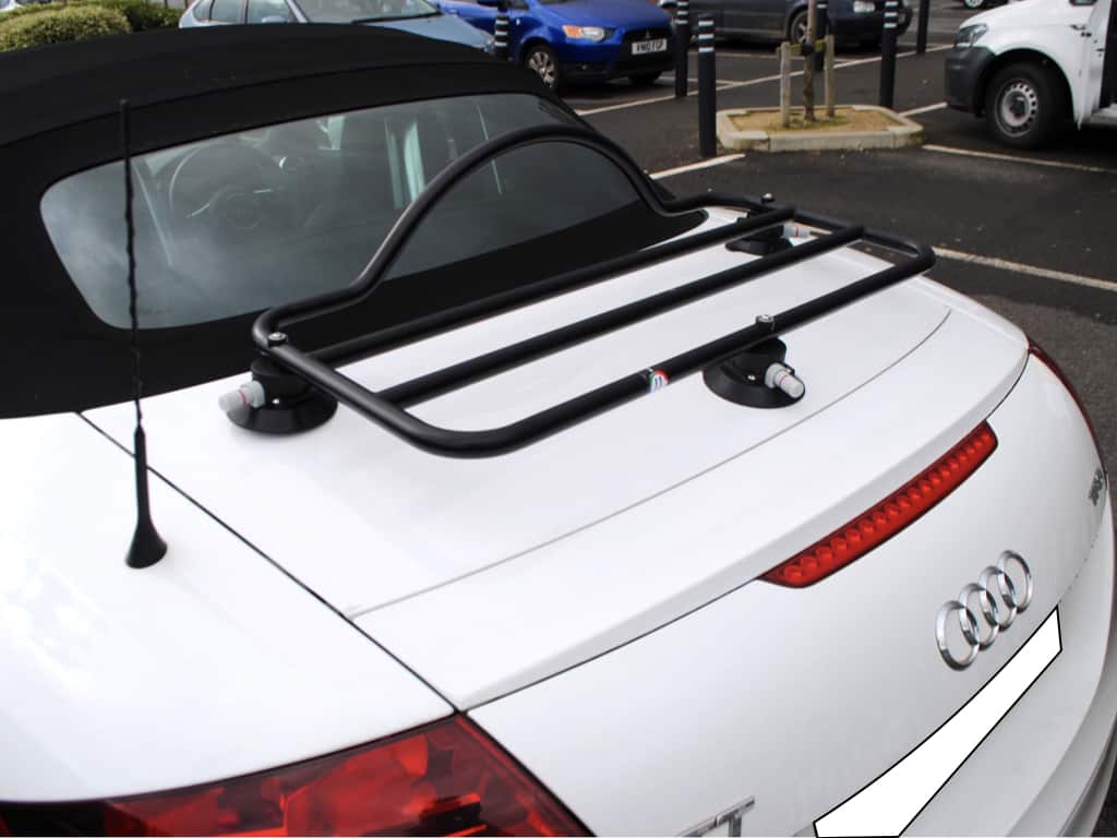 white audi tt roadster mk2 with a black revo-rack luggage rack fitted