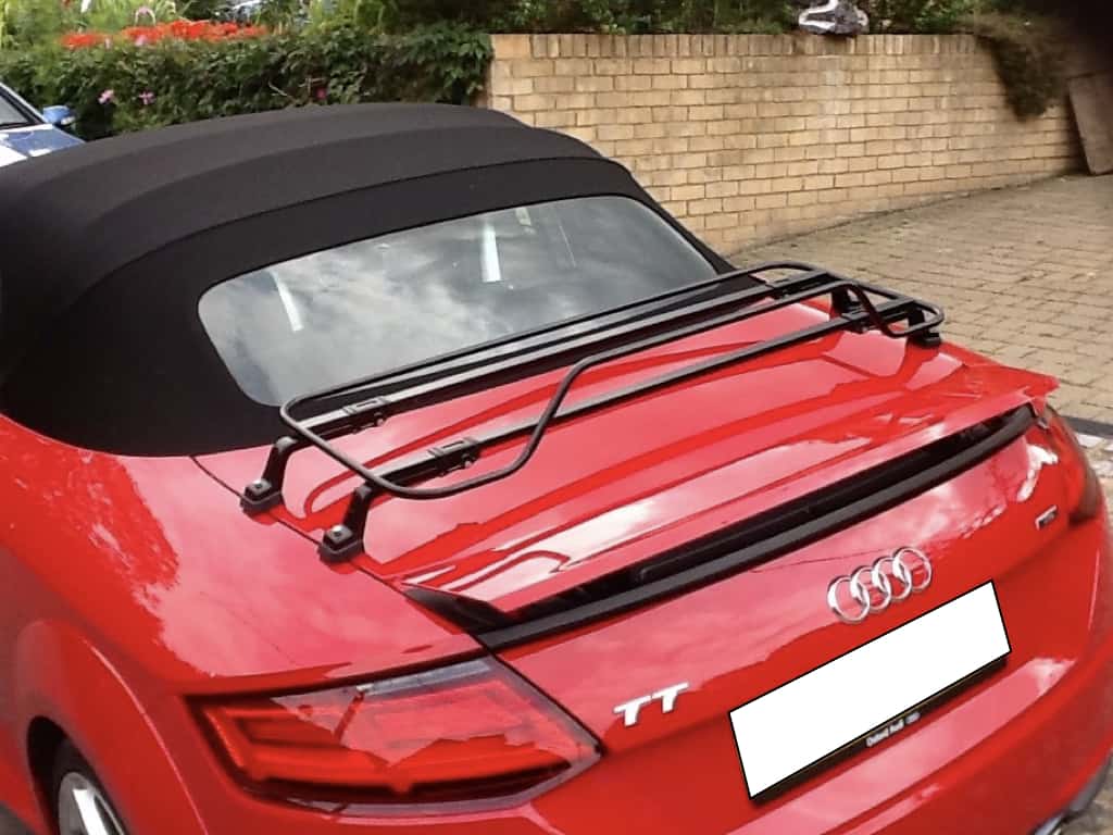 red audi tt mk3 typ8s roadster with a black luggage rack fitted