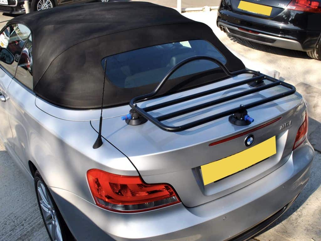 silver bmw 1 series convertible with a black luggage rack fitted