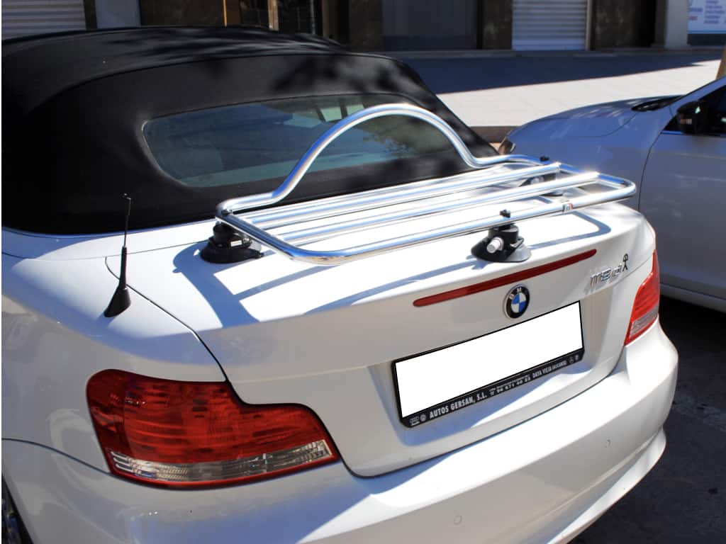 white bmw 1 series convertible with chrome luggage rack fitted