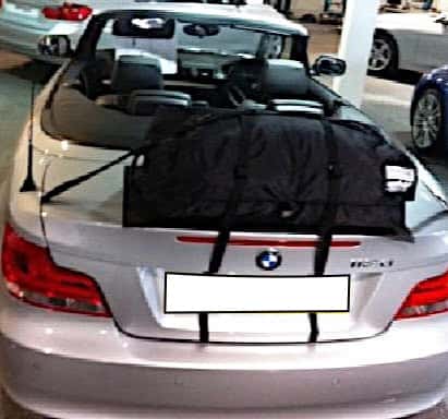 aerial view of a silver bmw 1 series convertible with the hood down and a boot-bag original luggage rack fitted