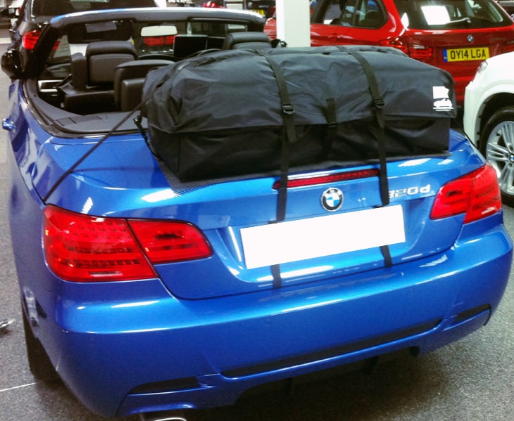 blue bmw e93 convertible 3 series with a boot-bag vacation luggage rack fitted 