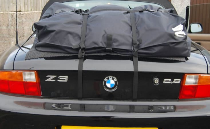 black bmw z3 2.8 with a boot-bag vacation luggage rack fitted