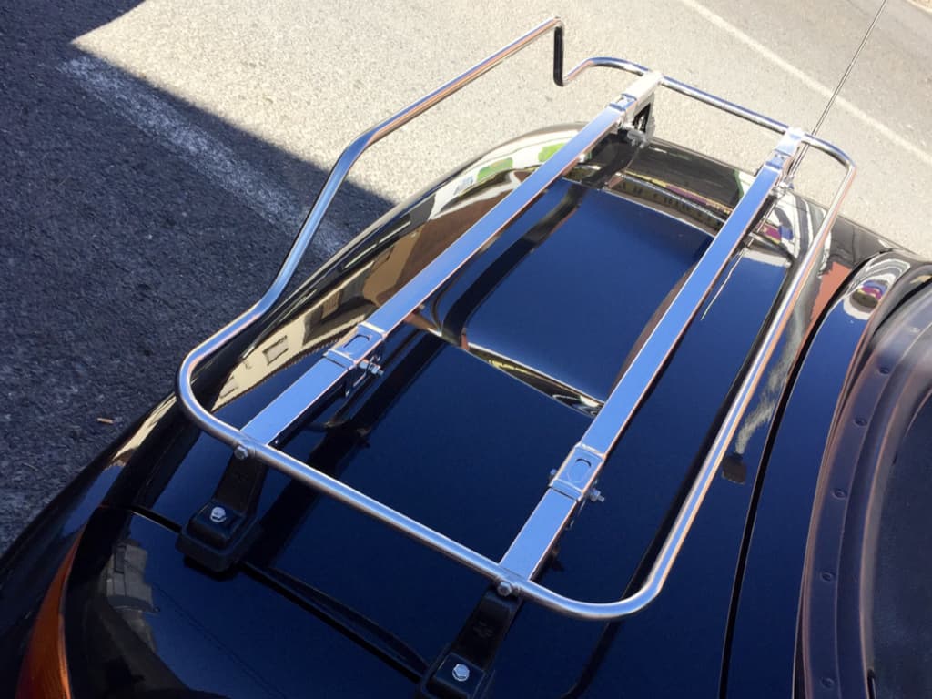 close up of a stainless steel luggage rack fitted to a bmw z3 