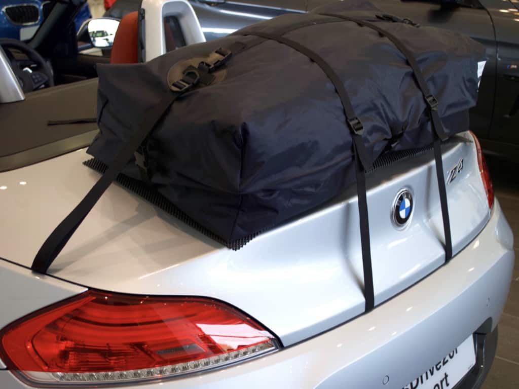 silver bmw z4 e89 with a bot-bag vacation luggage rack fitted in a bmw showroom
