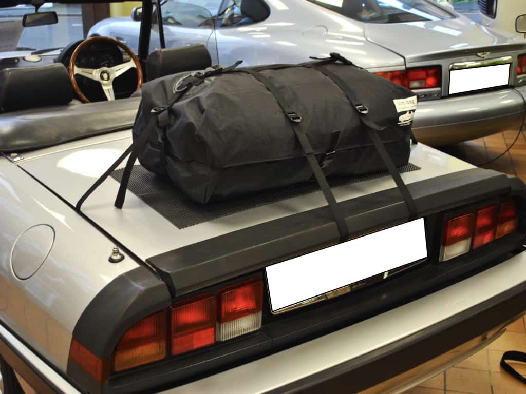 silver classic alfa romeo spider boat-tail with a boot-bag original luggage rack fitted