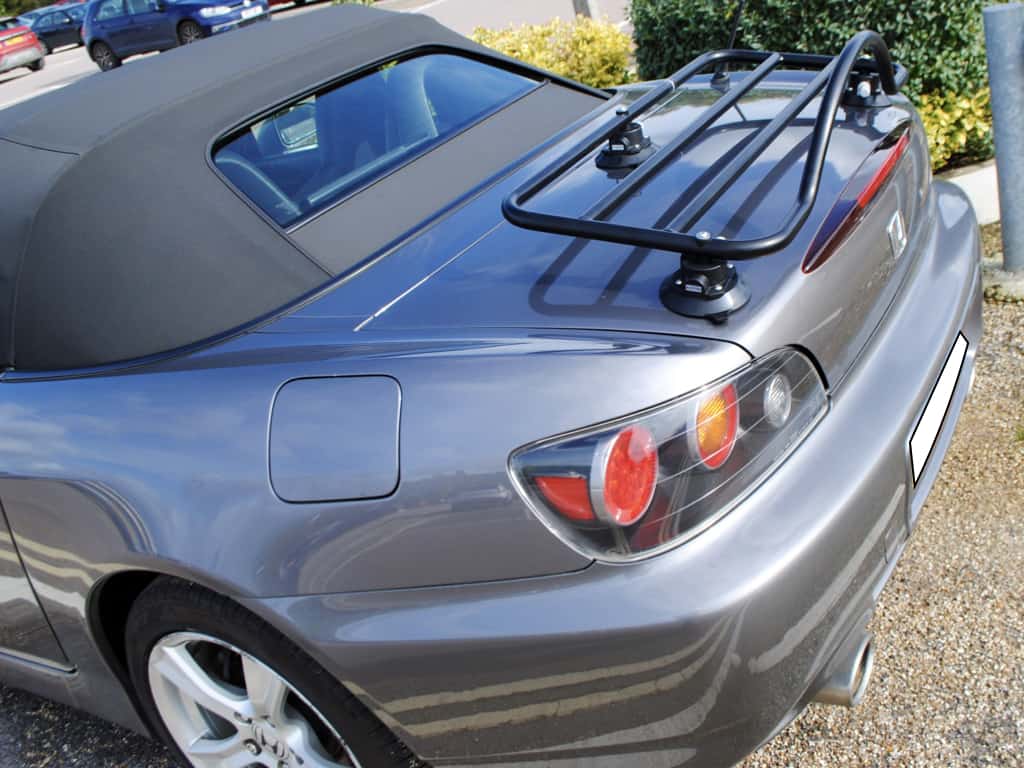graphite honda s2000 with a revo-rack black luggage rack fitted photographed from the side.