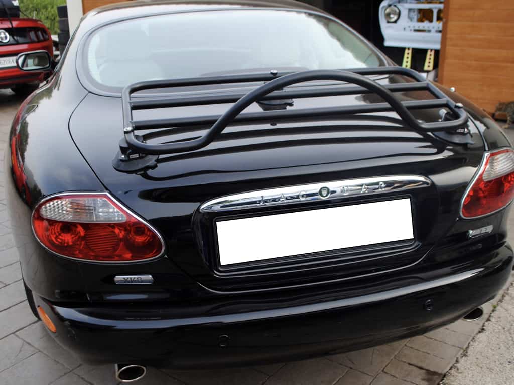 black jaguar xk8 coupe with a revo-rack luggage rack fitted