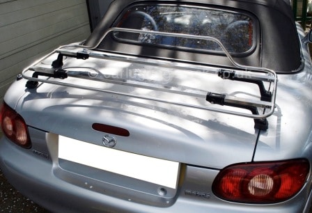 silver mazda mx5 mk2 with a stainless steel luggage rack fitted to the boot