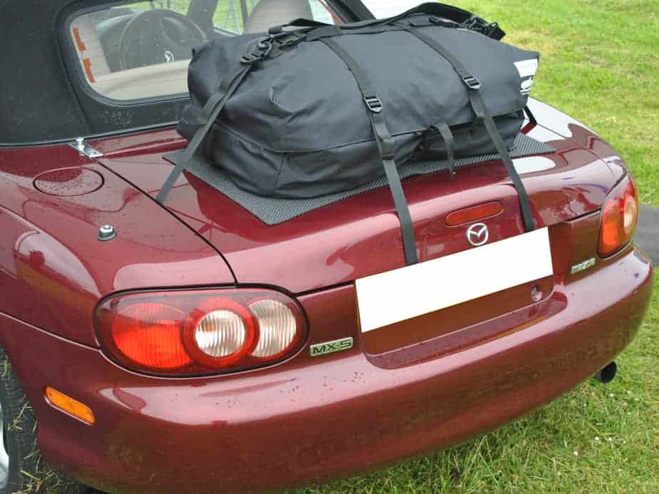 burgandy mazda mx5 mk2 with a boot-bag original luggage rack fitted