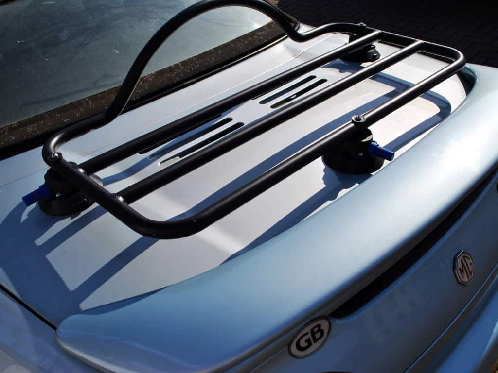 light blue mgf with a spoiler and a revo-rack black luggage rack fitted photographed close from above