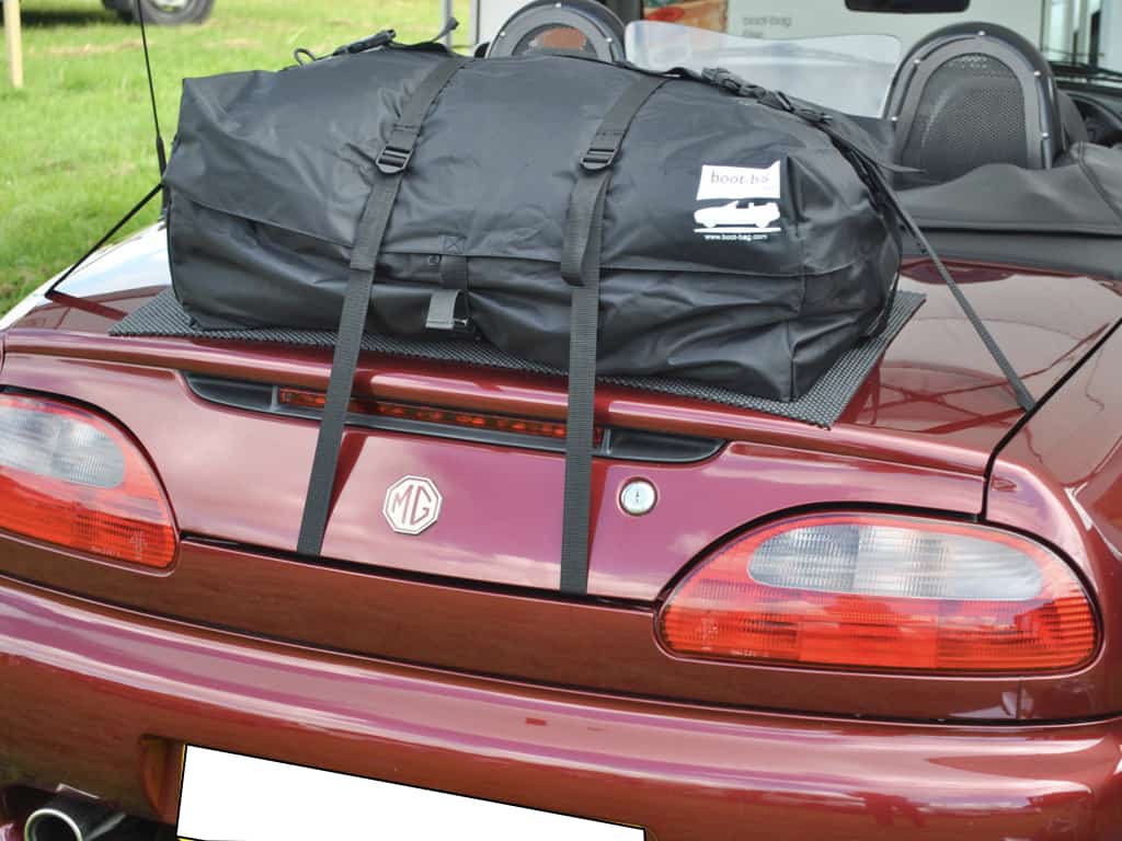 burgundy mgtf with the hood down and a boot-bag original luggage bag/rack fitted to the bot