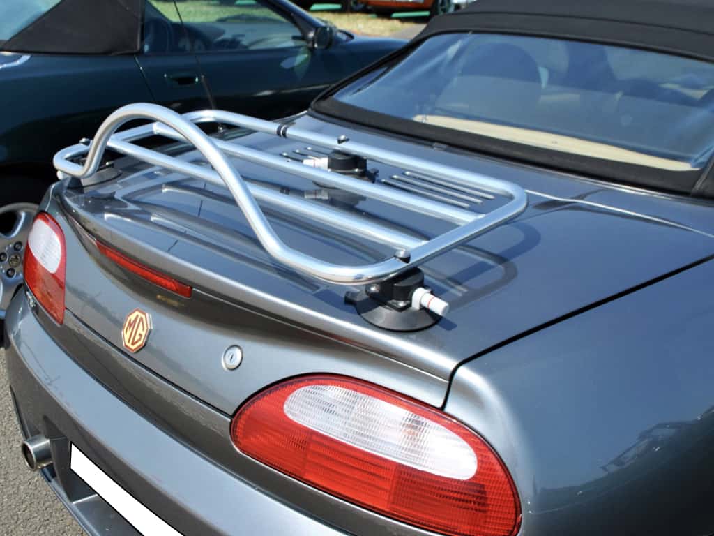 stainless steel luggage rack fitted to a dark grey mgtf