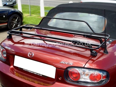 burgundy mazda mx5 mk3 with a spring black luggage rack fitted