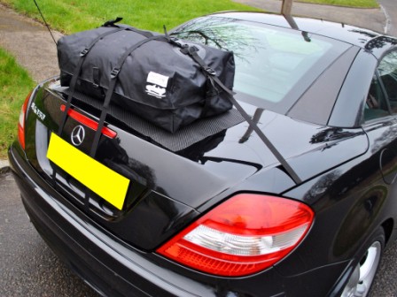 black mercedes benz slk r171 with a boot-bag original luggage rack fitted