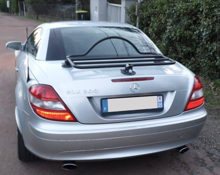 rear view of a silver mercedes benz slk r171 with a revo-rack black luggage rack fitted