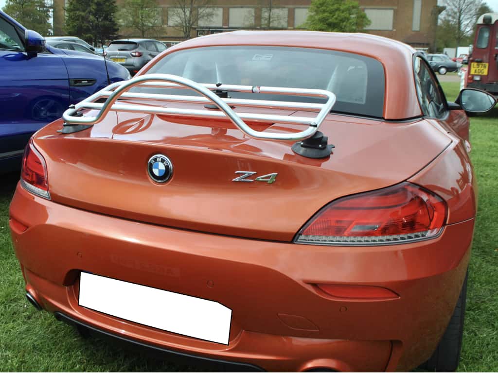 orange bmw z4 e89 at bicester heritage with chrome luggage rack fitted
