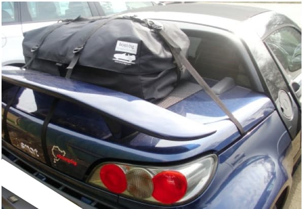 blue smart roadster with a boot-bag boot luggage rack fitted 