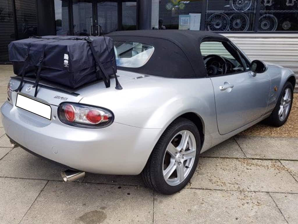 silver mx5 mk3 with a boot-bag vacation luggage rack fitted