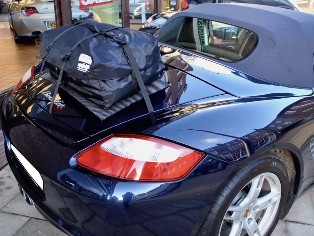 blue porsche boxster 987 with a boot-bag original luggage rack fitted