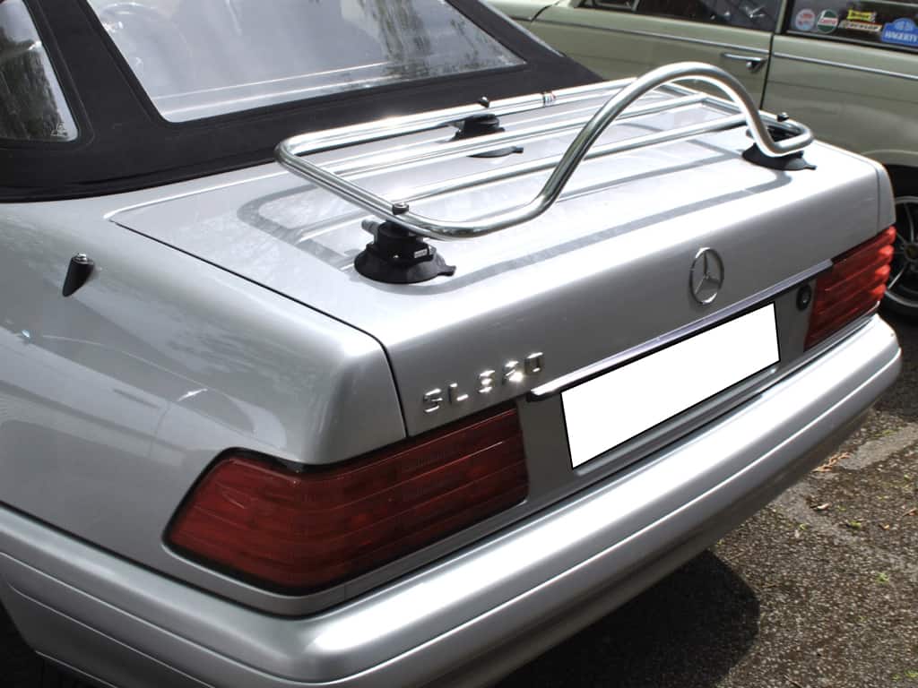 silver r129 mercedes benz sl with a revo-rack luggage rack fitted photographed from the side