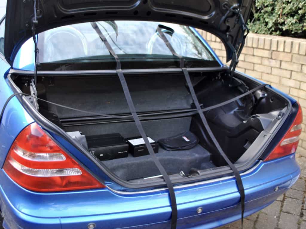 stage one of fitting a boot-bag original luggage rack to a mercedes slk