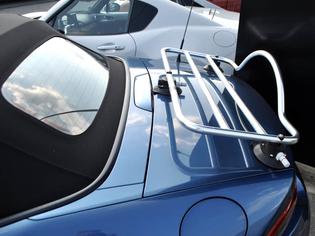 blue mazda mx5 mk4 nd with a revo-rack pa luggage rack fitted photographed from the side