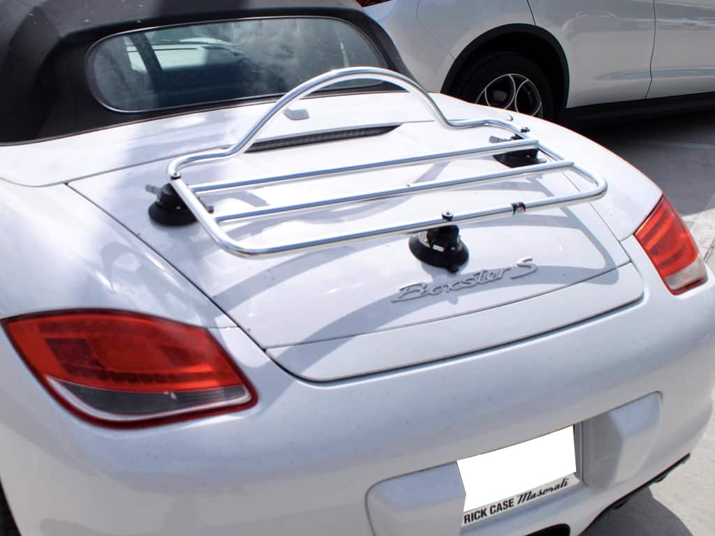 white 987 porsche boxster with a revo-rack pa luggage rack fitted