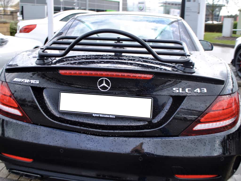 rear view of a black mercedes benx slc amg 43 with a revo-rack black luggage rack fitted