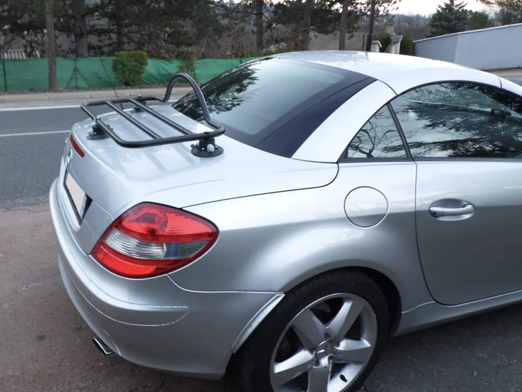 side view of a silver mercedes benz slk r171 with a luggage rack fitted
