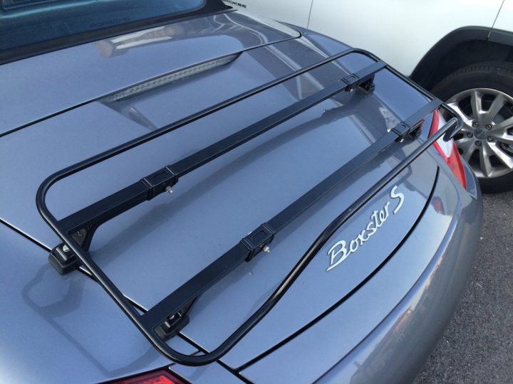 close up of black luggage rack fitted to grey 987 porsche boxster