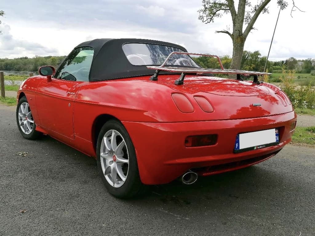 ref fiat barchetta hood up with a stainless steel luggage rack fitted