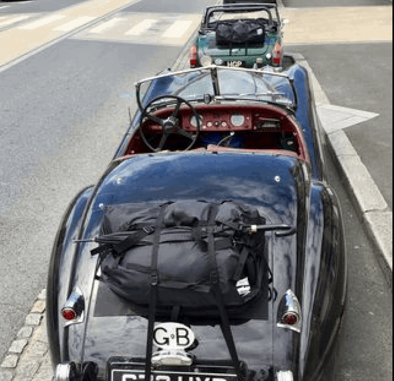 black jagaur xk120 with a boot-bag luggage rack fitted