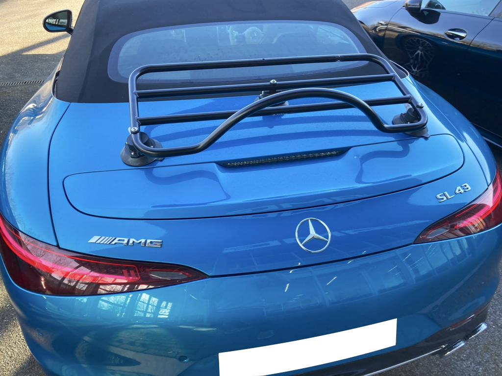 blue r232 mercedes sl 43 AMG with a Revo-Rack luggage rack fitted to the bot