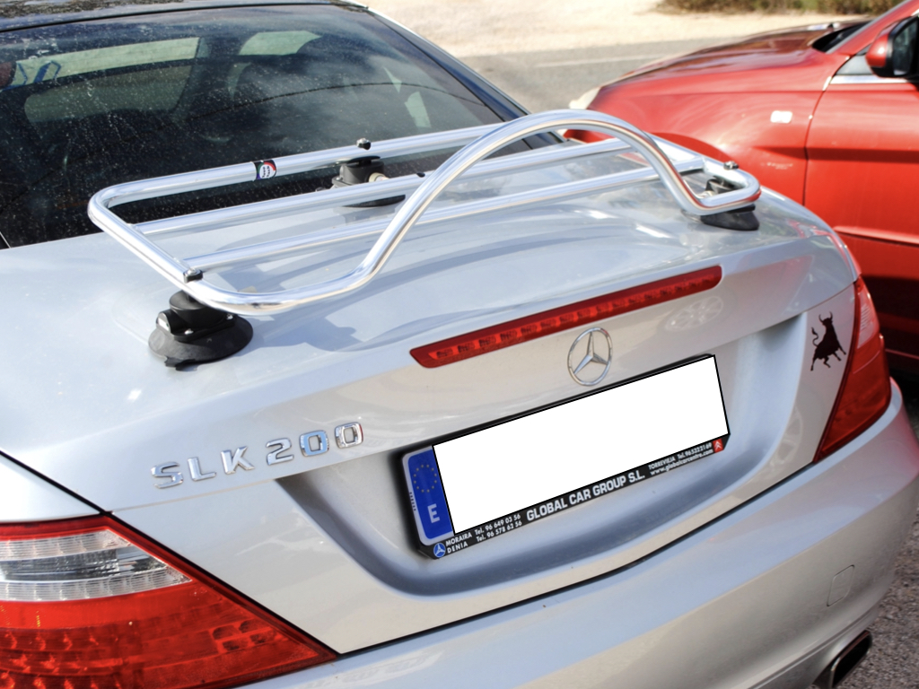 silver mercedes slk 200 r172 with a revo-rack chrome luggage rack fitted to the boot photographed close at the rear