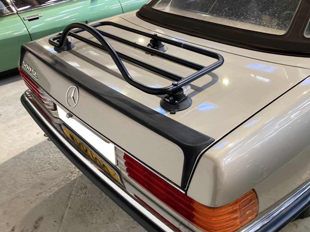 silver mercedes sl 500 R107 with a revo-rack black luggage rack fitted 