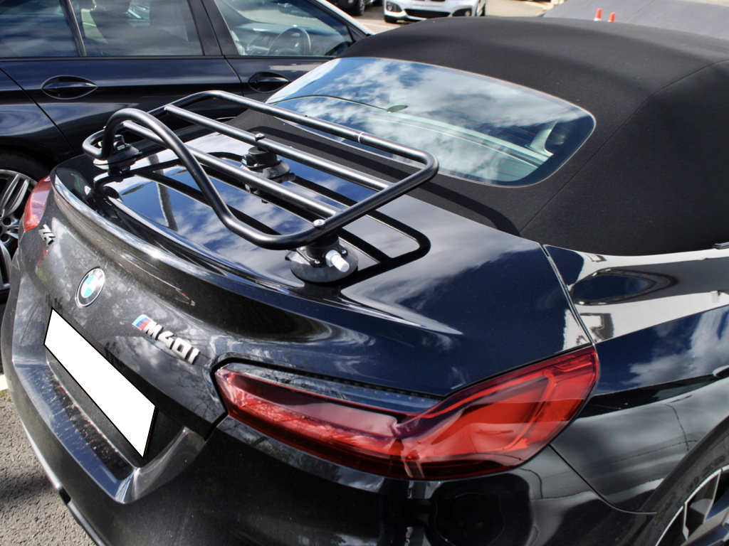 black bmw z4 g29 with a black luggage rack fitted photographed close form the side