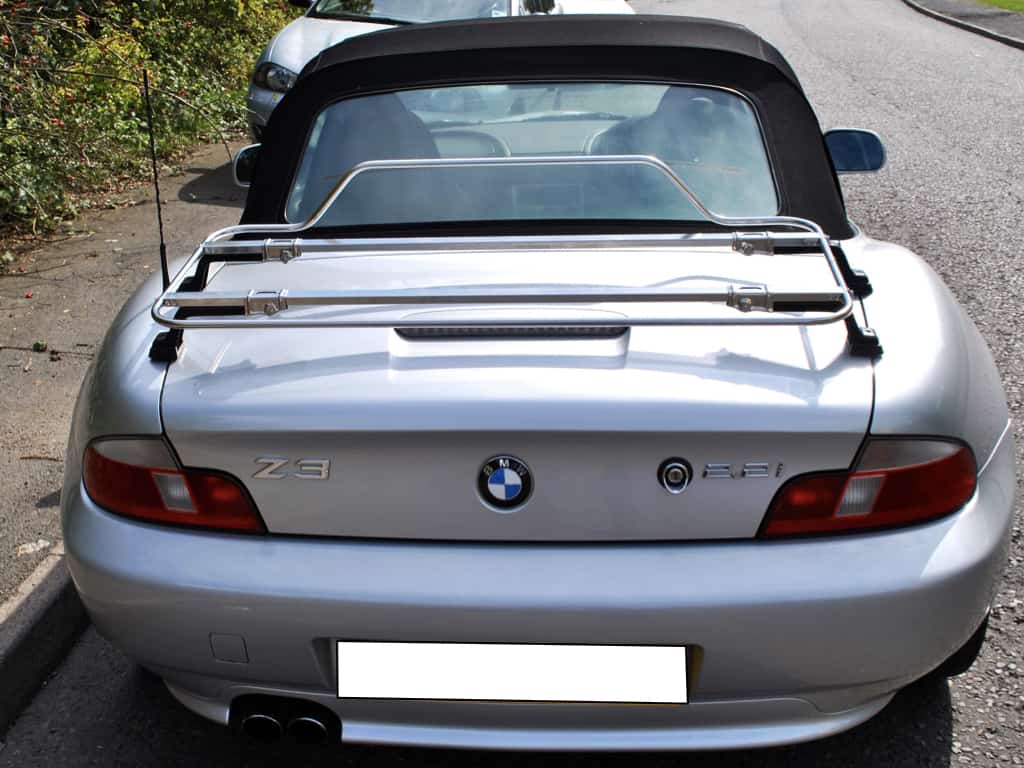 BMW Z3 with Italian stainless steel luggage rack attached parked on road